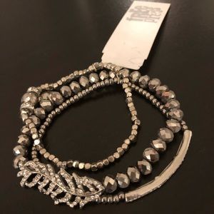 Pretty triple bracelet with jewel feather accent